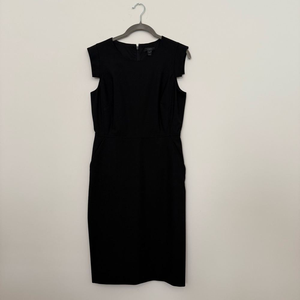 J. Crew Elegant Black Resume Dress. Pockets, back vent and zipper. Sleeveless.